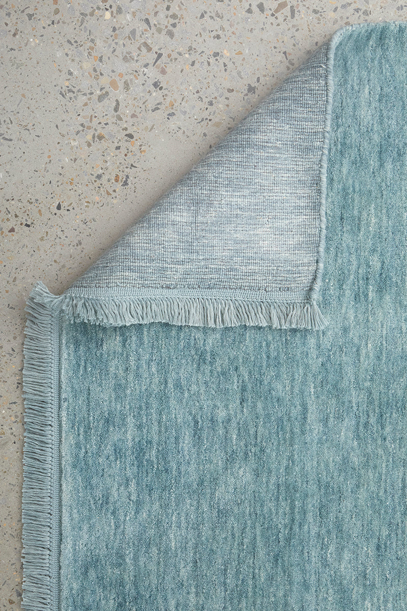 Hand-Loomed Sky Blue Tassel Wool Rug