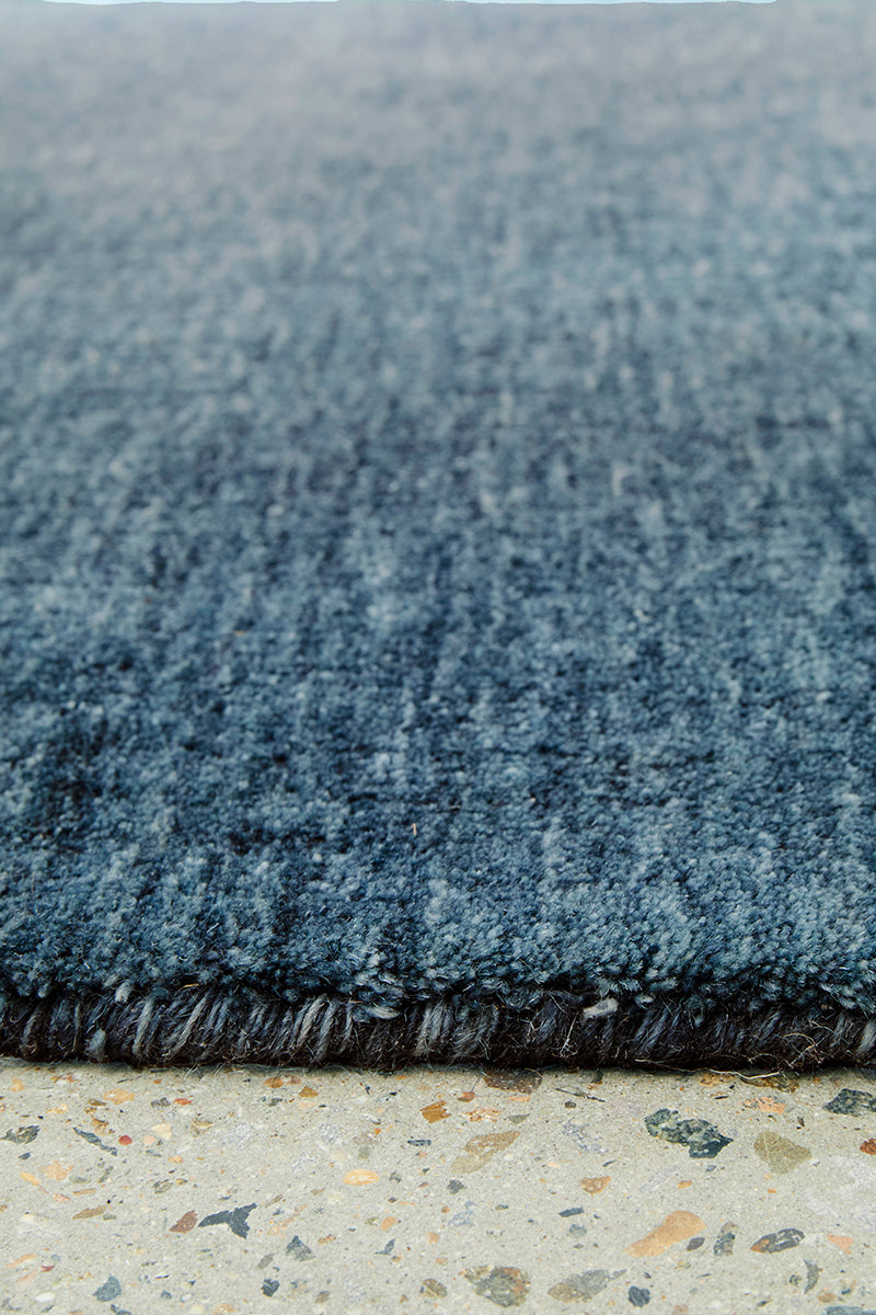 Hand-Loomed Navy Tassel Wool Rug