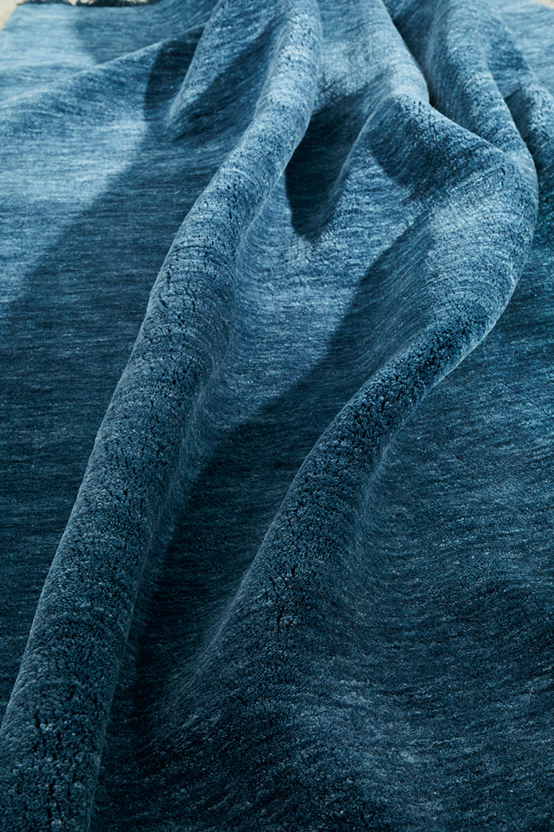 Hand-Loomed Navy Tassel Wool Rug