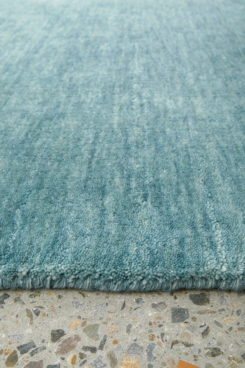 Hand-Loomed Sky Blue Tassel Wool Rug