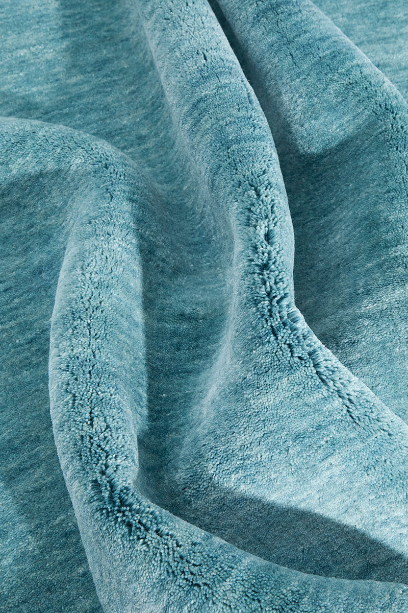 Hand-Loomed Sky Blue Tassel Wool Rug