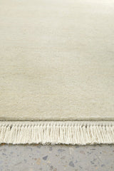 Hand-Loomed Cream Tassel Wool Rug - Lost Design Society