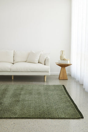 Hand-Loomed Forest Green Tassel Wool Rug - Lost Design Society