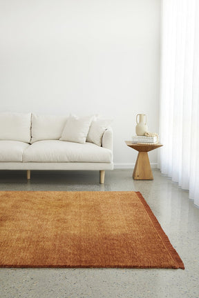 Hand-Loomed Terracotta Tassel Wool Rug - Lost Design Society
