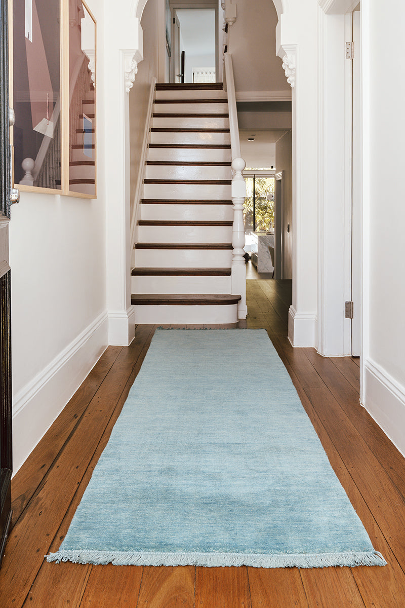 Hand-Loomed Sky Blue Tassel Wool Rug