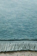 Hand-Loomed Sky Blue Tassel Wool Rug